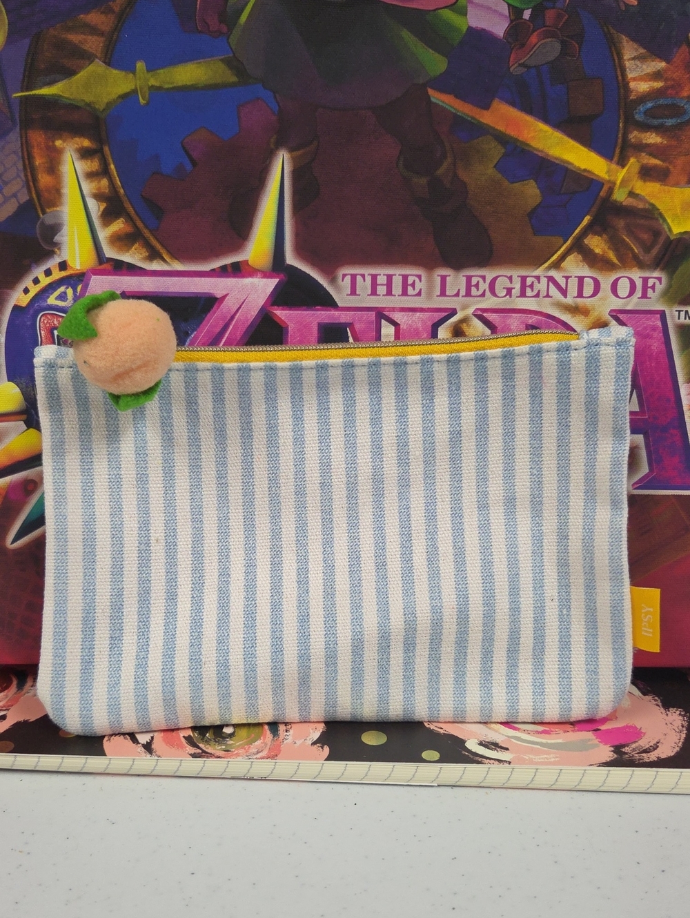 Blue & White Stripe Cosmetic Pouch with Peach Charm